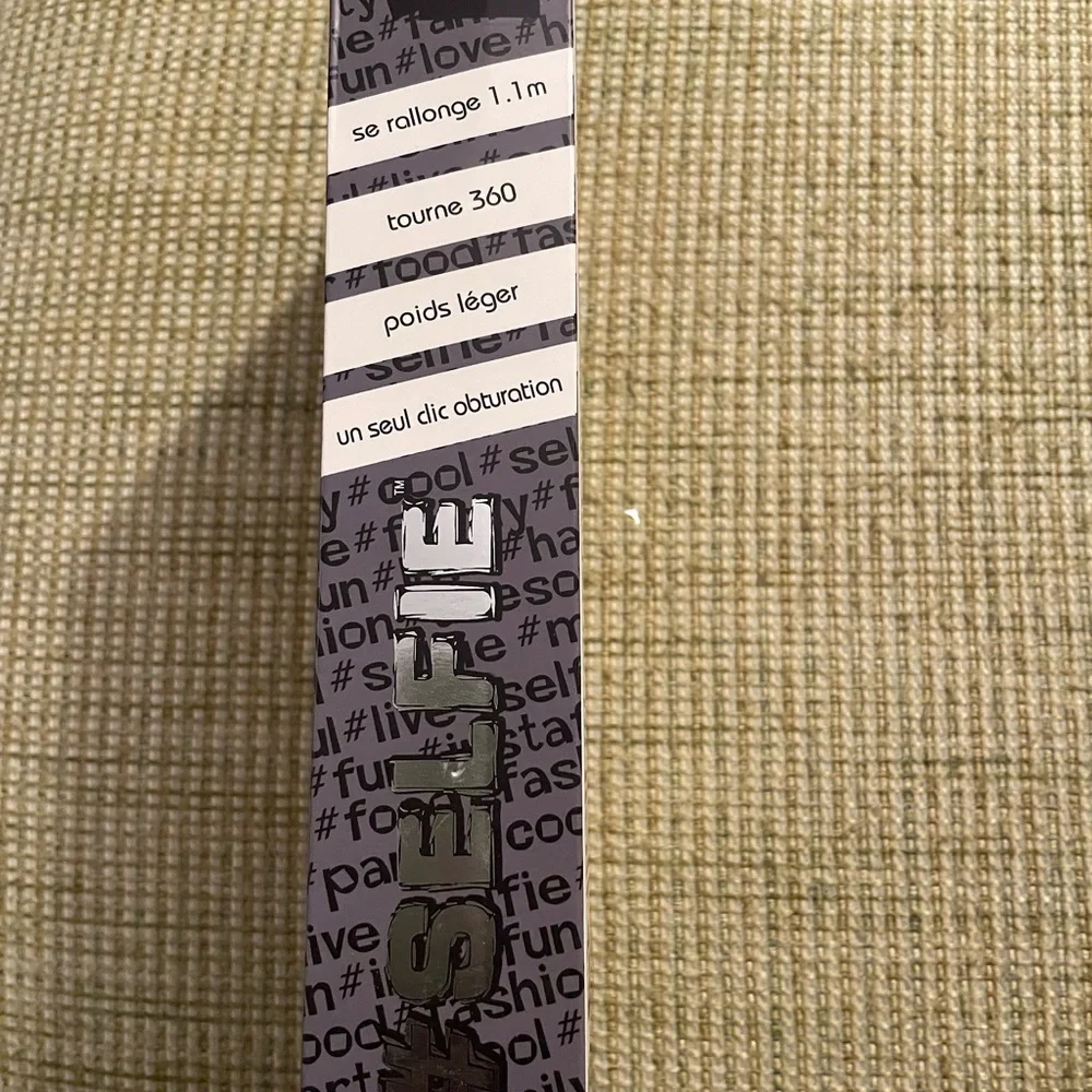 Black Selfie Stick with Built-in Shutter. For use with all smartphones